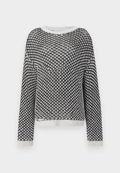 Μπλούζα από πλεκτό ύφασμα σε ασπρόμαυρο με υφή, στρογγυλή λαιμόκοψη και μακριά μανίκια. Ριμπ τελείωμα και μανσέτες με αντίθετα χρώματα.