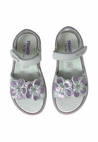 Sandali bianchi in pelle con suola viola, caratterizzati da due grandi applicazioni floreali con glitter e dettagli di gemme. Cinturino regolabile per una vestibilità sicura.