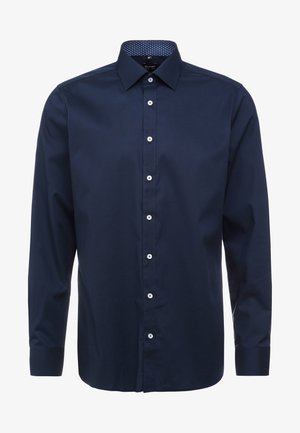 Dunkelblaues Langarmhemd aus glattem Stoff, mit spitzem Kragen, durchgehender Knopfleiste und gemustertem Innenkragendetail.