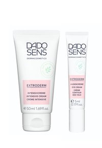 Two tubes of DADO SENS dermacosmetics in white packaging. The larger tube (50 ml) is labeled "EXTRODERM Intensive Cream" with pink accents. The smaller tube (5 ml) is labeled "EXTRODERM Eye Cream."