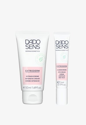 Zwei Tuben von DADO SENS Dermakosmetik in weißer Verpackung. Die größere Tube (50 ml) ist mit "EXTRODERM Intensive Cream" beschriftet und hat pinke Akzente. Die kleinere Tube (5 ml) ist mit "EXTRODERM Augencreme" beschriftet.