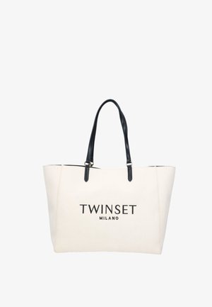Sac fourre-tout en toile crème avec des anses en cuir noir ; arbore le logo imprimé "TWINSET MILANO" à l'avant. Design structuré et ouverture sur le dessus.