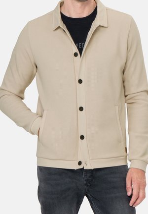 Strickjacke - beige