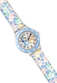 Orologio rotondo con cassa argentata, lunetta blu chiaro, cinturino in tessuto decorato con personaggi dei cartoni animati colorati e quadrante multicolore.