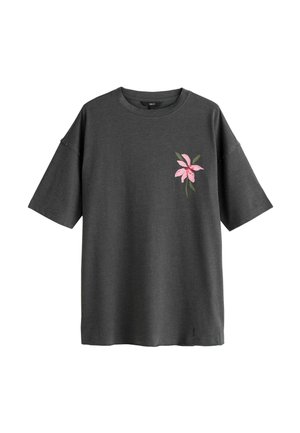 Charcoal gray short-sleeve T-shirt with crew neck and small pink flower graphic with green leaves on the left chest.