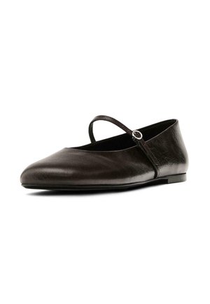 Black leather flat shoe with a rounded toe, narrow strap, and circular buckle detail. Smooth texture and low-profile design.