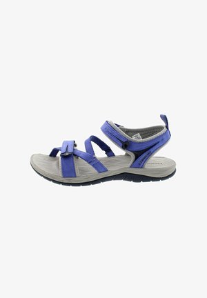 Lila Riemchensandalen mit verstellbaren Klettverschlüssen, strukturiertem grauen Fußbett und schwarzer gemusterter Laufsohle, die für Komfort und Grip sorgt.