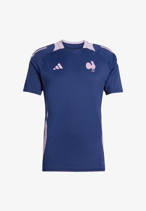 Blue athletic jersey made of breathable fabric featuring short sleeves, a crew neck, and white accents on the shoulders and sides. Displays a rooster logo.