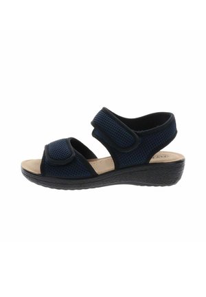 Sandalia azul marino de dedo abierto con tiras ajustables de velcro, plantilla beige acolchada y suela negra texturizada para comodidad y soporte.