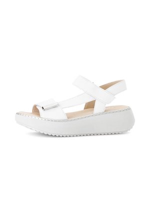 White platform sandals with cross-strap design, soft leather material, rounded toe, and textured sole. Features a subtle metallic accent.
