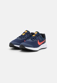 Nike Performance REVOLUTION UNISEX granatowy