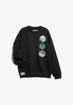 Felpa nera con tre grafiche a cubo pixelate di Minecraft sul petto e testo con il logo di Minecraft sulla manica sinistra e sull'orlo inferiore.