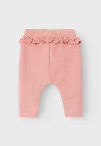 Leggings in cotone rosa con un bordo arricciato in pizzo in vita e un design a gamba affusolata. Morbido al tatto e con una vestibilità comoda.