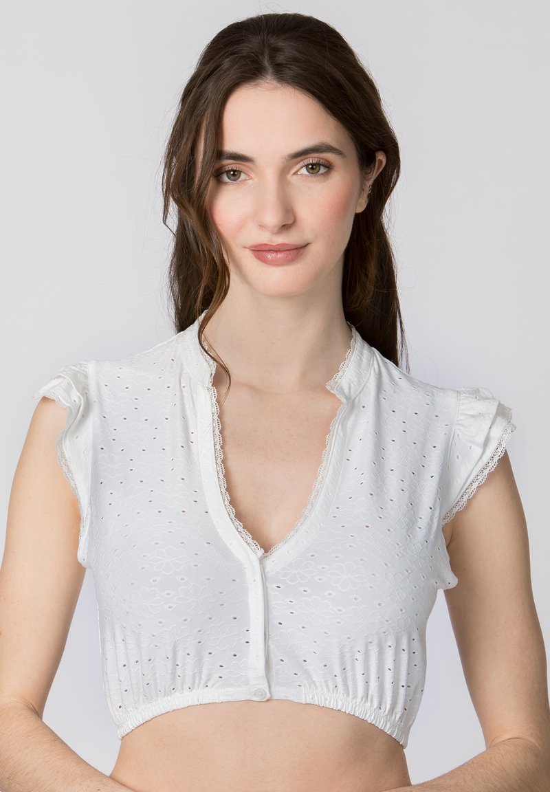 White cropped top with short ruffled sleeves, made from eyelet fabric featuring a floral pattern and a lace-trimmed neckline, button closure.