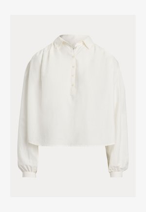 Biała bluzka na guziki z kołnierzykiem, o kroju krótkim, z długimi bufiastymi rękawami. Wykonana z miękkiego materiału o gładkiej fakturze.