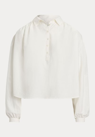 Hvit knappoppskjorte med krage, kort design og lange ballongermer. Laget av mykt stoff med glatt tekstur.