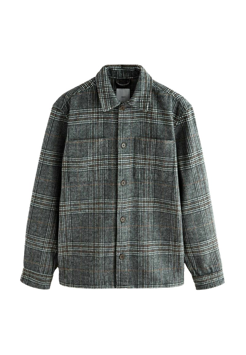 Rutet flannel skjorte i grå og grøn. Funktioner en knaplukning foran, to brystlommer og en klassisk krave med en struktureret stof.