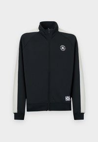 Μαύρο μπουφάν με φερμουάρ, γκρι πλαϊνές πινελιές, ριμπ μανσέτες και τελείωμα. Διαθέτει στρογγυλό λογότυπο στο στήθος και φερμουάρ στο μπροστινό μέρος.