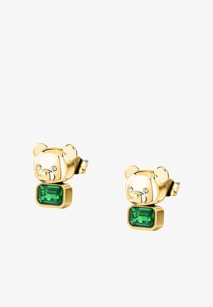 Goldene Bären-Ohrstecker mit kleinen klaren Steinen als Augen und rechteckigen grünen Edelsteinen unter den Bärenköpfen.