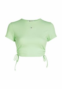 Lys grøn ribbet crop top med korte ærmer, justerbare sidebånd og en lille logo detalje på brystet. Glat tekstur gennem hele toppen.