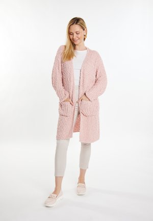 Roze gebreide lange cardigan met textuurstof, open voorkant en twee voorzakken. Naadloze mouwen en een knielange ontwerp.