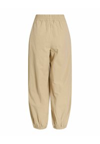 Pantalon beige coupe ample avec ceinture élastique et ourlets élastiques, présenté de dos sur fond blanc.