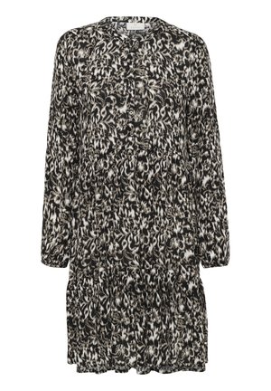 Black and white patterned dress with a round neckline, long sleeves, and button details; ruffled hem adds texture and fullness.