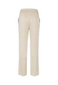 Beige trousers with a relaxed fit, featuring an elastic waistband, side pockets, and a smooth, woven texture.
