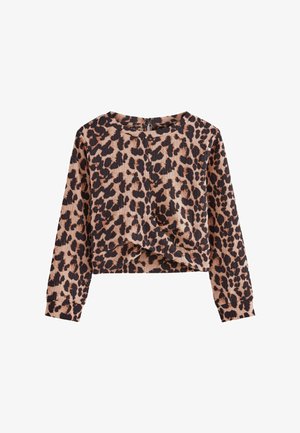 Løveprint cropped sweater med lange ærmer, rund halsudskæring og en twist foran. Fremstillet af et tekstureret stof i beige og sort.
