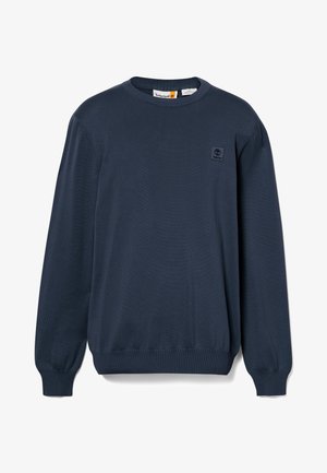 Mørkeblå strikket sweater med lange ærmer, ribbede manchetter og kant, med et lille sort Timberland-logo på brystet.