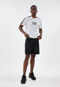 Koton Pantaloni sportivi - black