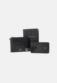 Black leather wallet set featuring a zippered card holder, passport cover, and card slot. All have embossed patterns and gold accents.