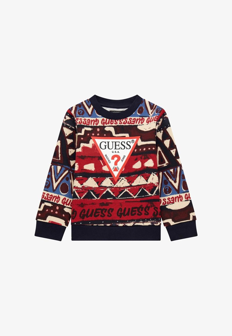 Sweat-shirt multicolore présentant des motifs géométriques en rouge, bleu et crème, avec des poignets côtelés et un logo triangulaire central.