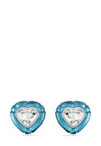 Hjärtfomade örhängen med turkos genomskinlig material och en klar, fasetterad mittsten samt en silverfärgad bezel-accent.