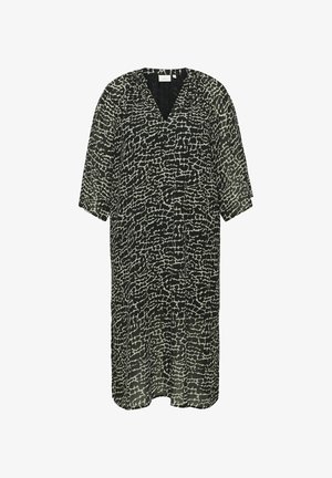 Mustvalge mustriga kleit V-kaelusega, lühikeste varrukatega ja vabalt langeva lõikega. Valmistatud kergest, poolläbipaistevast kangast.