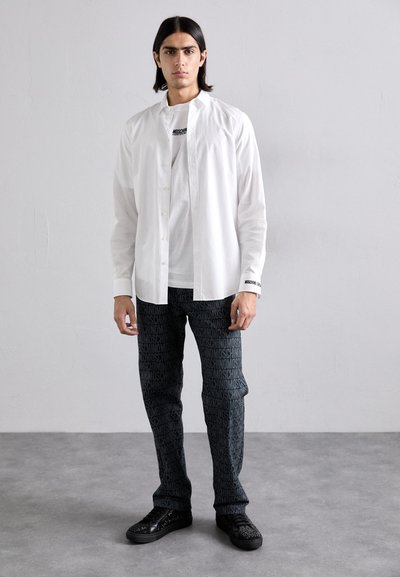 MOSCHINO UOMO - High-top trainers - nero