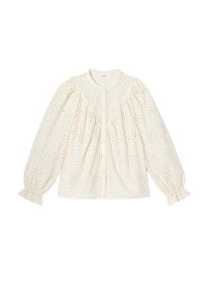 Blouse à manches longues couleur crème avec broderie ajourée, col rond, boutonnage sur le devant, épaules bouffantes et poignets élastiques ornés d'un volant.