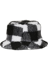 Bøttehatt laget av myk, svart, grå og hvit rutet stoff. Myk tekstur med en bred, flat brem og rund krone.