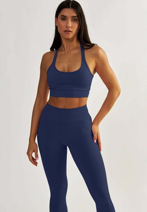 QUEEN SEAMLESS - Medium support sports bra - navy