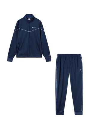 Granatowy dres wykonany z gładkiego, lekkiego materiału. Kurtka ma zamek z przodu, wysoki kołnierz i białe akcenty; spodnie mają elastyczny pasek w talii.