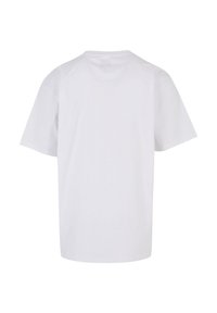 White cotton t-shirt, short sleeves, loose fit. Clean design, no patterns or accents. Soft texture, round neckline, back view displayed.