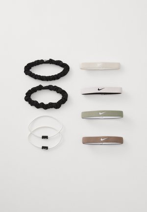 Set of eight hair accessories including two black scrunchies, two elastic bands, and four fabric headbands in various colors.