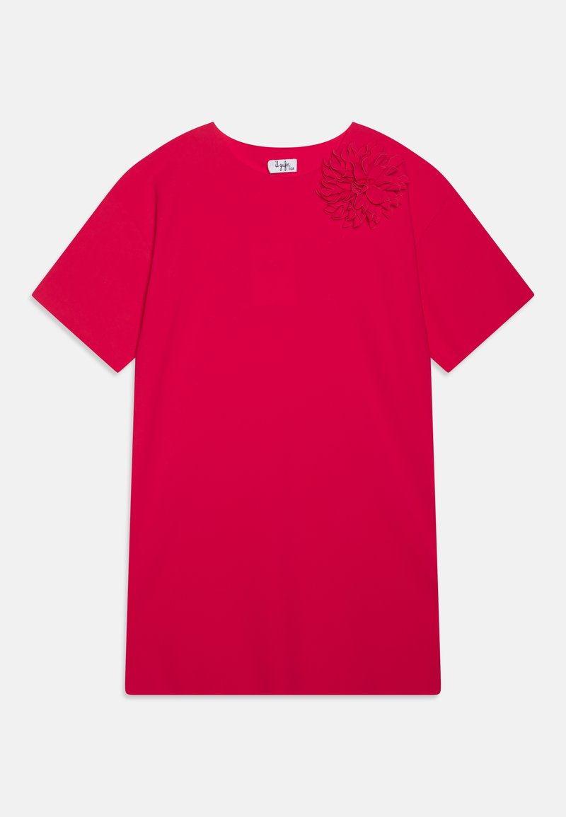 Rød t-skjorte med korte ermer og rund hals, med blomsterapplikasjonsdetalj på venstre skulder. Laget av myk, glatt stoff.