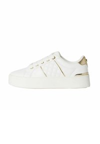 White sneaker with a platform sole, quilted pattern on the side, gold accents on the heel and eyelets, and smooth leather texture.