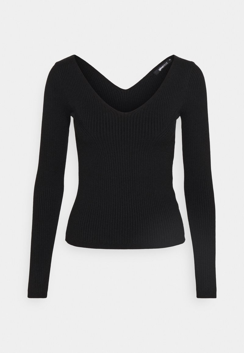 Haut en maille côtelée noire à manches longues avec un décolleté en V profond et une taille cintrée, présenté sur un fond plat.