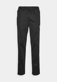 Pantalones deportivos negros con cintura ajustable con cordón, bolsillos con cremallera y acentos de logotipo blanco en los lados. Tejido suave con un diseño ajustado.
