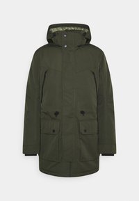 Olivgrön parka med huva, med dragkedja framtill, justerbara snoddar, två stora framfickor och svarta detaljer. Slät, slitstark tyg.