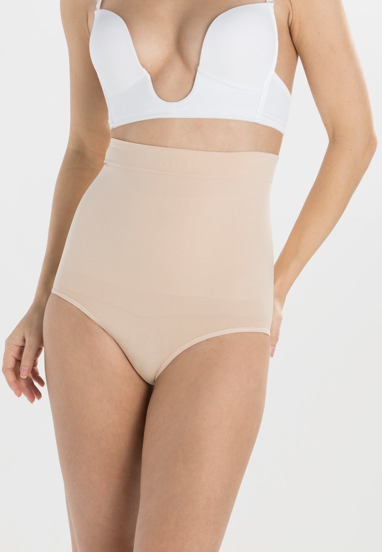 Beige korkeavyötäröiset muotoilevat alushousut, jotka on valmistettu sileästä elastisesta materiaalista. Niissä on leveä vyötärönauha ja saumatonta muotoilua, joka takaa sujuvan istuvuuden.