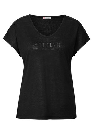 Mustan T-paidan lyhyet, löysät hihat ja leveä kaula-aukko. Keskellä on hienovarainen, haalistunut graafinen tekstisuunnittelu. Pehmeä kangas.