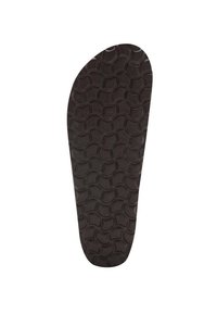 Svart gummisula med ett texturerat mönster av sammanlänkade cirklar; ergonomisk form med rundade kanter, lämplig för användning i skor.